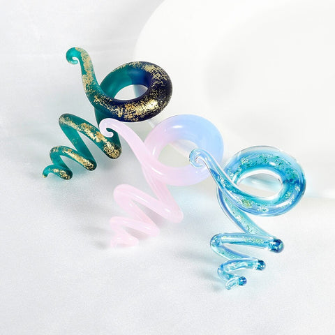 High quality ear glass spiral plug gauges with free shipping to your doorstep. Our lobe stretchers are sold as pairs and checked for flaws.