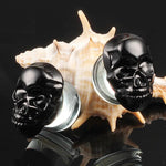 Skull glass ear plugs 6mm to 16mm. Free shipping to your doorstep. Ear lobe glass plugs, sold as pairs and checked for flaws.