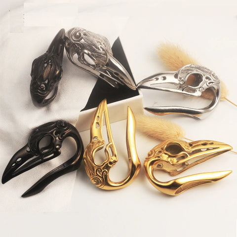 Raven skull ear weights with free worldwide shipping. Ear hangers, ear plug gauges. Sold as pairs and checked for flaws.