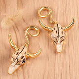 Dangle gnu skull ear weights with free shipping to your doorstep. Ear lobe stretching hangers sold as pairs and checked for flaws.