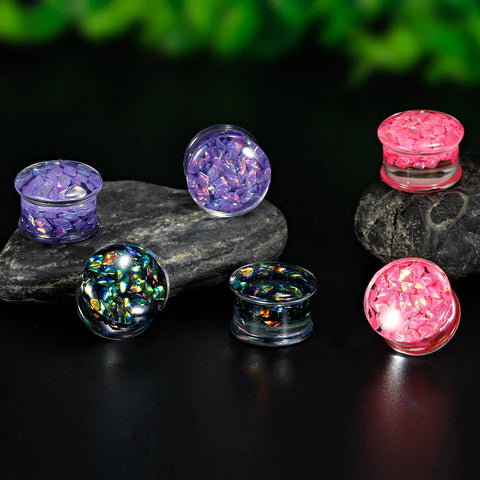 Colorful saddle ear plug gauges. Free shipping to your doorstep. Checked for flaws and sold as pairs.