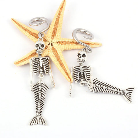Scary skeleton mermaid ear weights with free shipping to your doorstep. Skeleton ear hangers sold as pairs and checked for flaws.