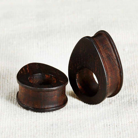 Pair of vintage wooden oval ear tunnels with free shipping to your doorstep. Ear tunnels and plugs for ear stretching. Sold as pairs and checked for flaws.