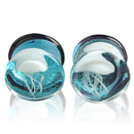 White jellyfish ear glass gauges.