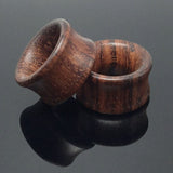 Pair of saddle wooden ear tunnel gauges 8mm to 18mm with free worldwide shipping. Our ear tunnels are sold as pairs and checked for flaws.