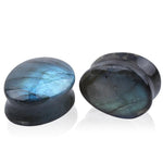Saddle stone ear plugs, free shipping to your doorstep. Labradorite oval ear plugs. Sold as pairs and checked for flaws.