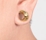 Gold half moon saddle ear gauges. Free worldwide shipping.